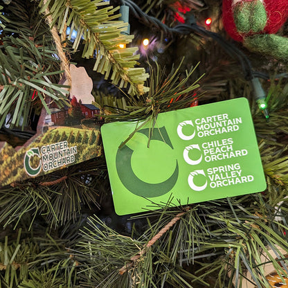 Chiles Family Orchards gift card hanging on a Christmas tree